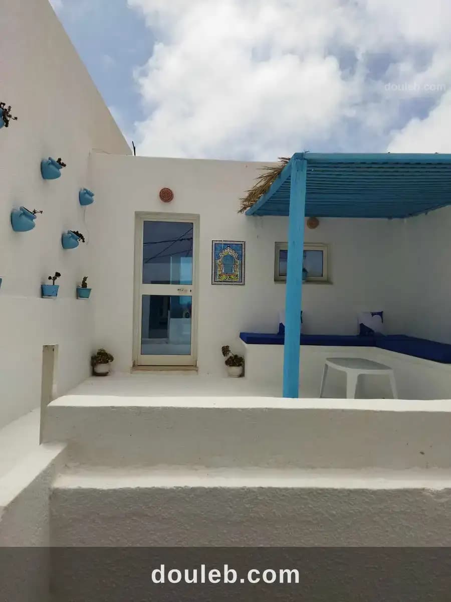 Maison kelibia plage vu sur mer pied dans leau à Nabeul