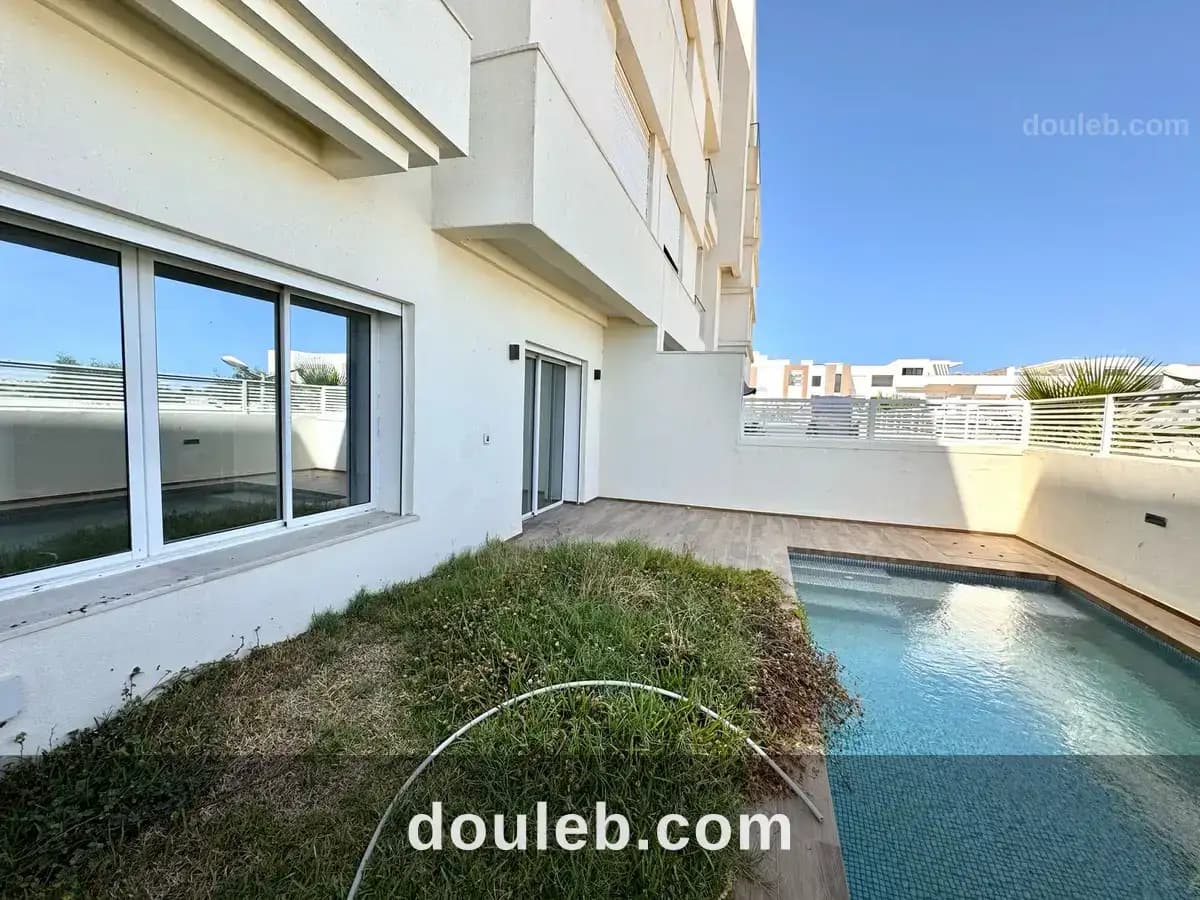 Agréable duplex s3 avec piscine à gammarth - Miniature 4