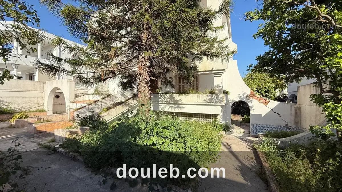 Villa sur trois niveaux a menzah 6 - Miniature 4