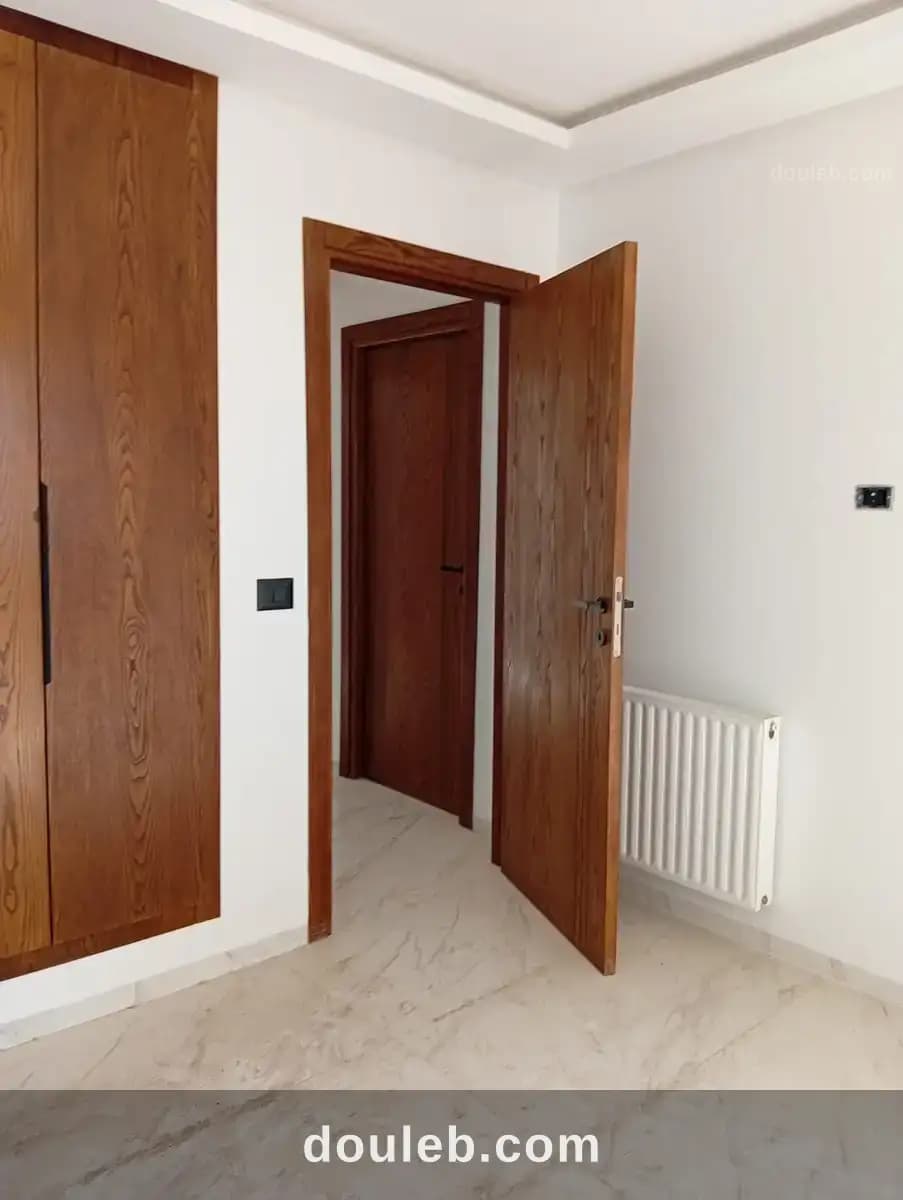Un appartement s2 jamais habité à cité wahat à Tunis