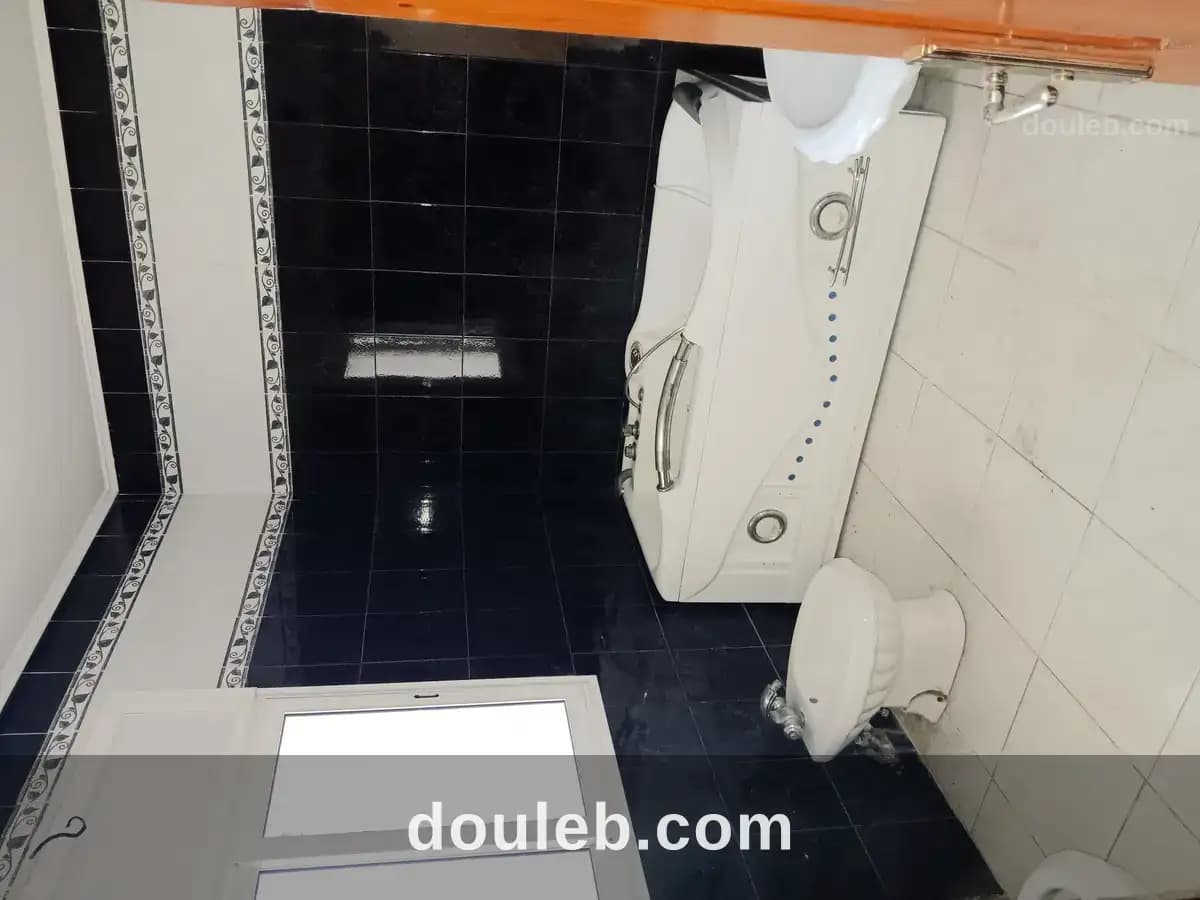 Appartement dans maison snit bhira titre bleu à Bizerte