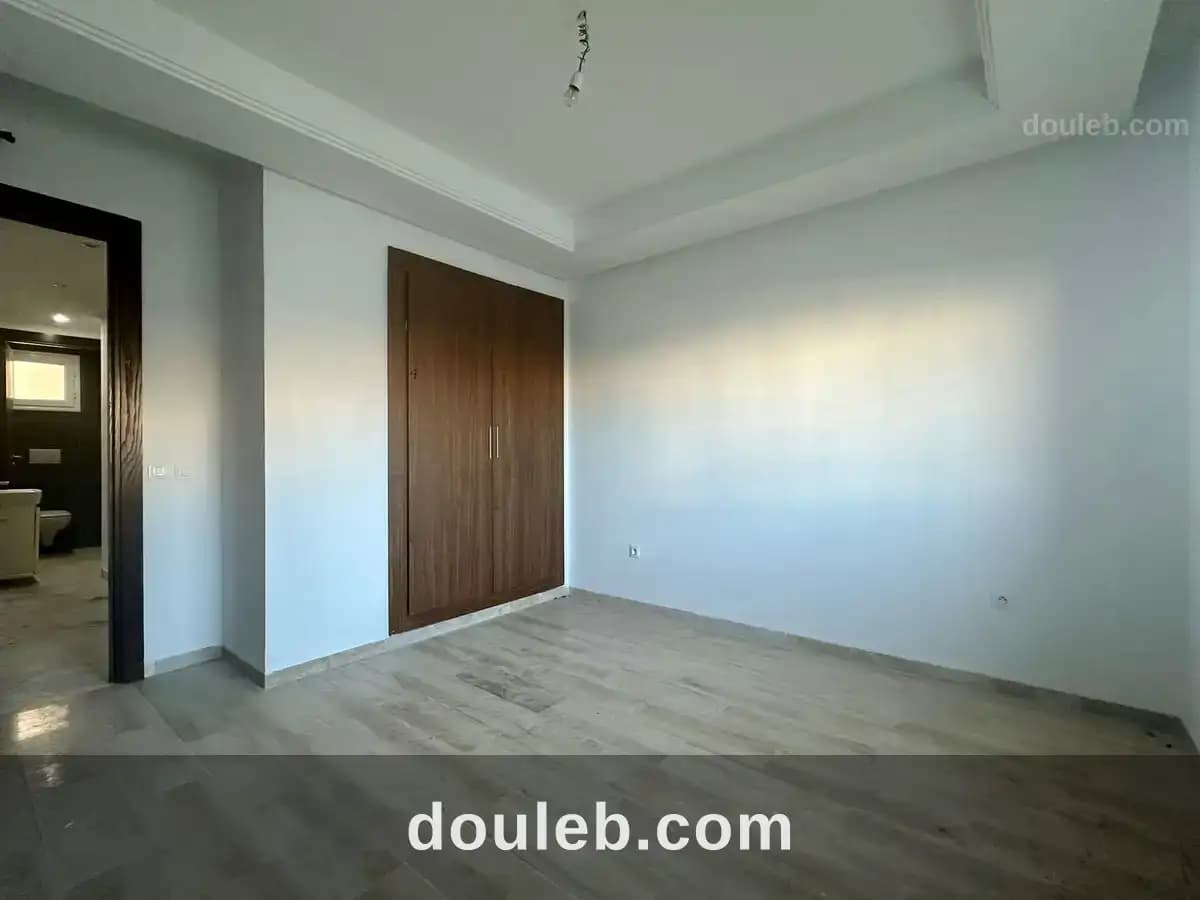 Appartement s2 avec jardin à cité ennasr - Miniature 2