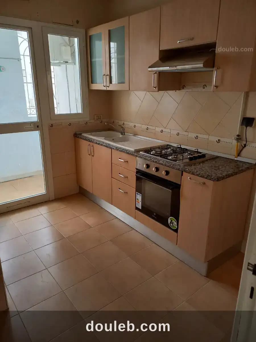 Un appartement s 2 cité nasr 2 - Miniature 3