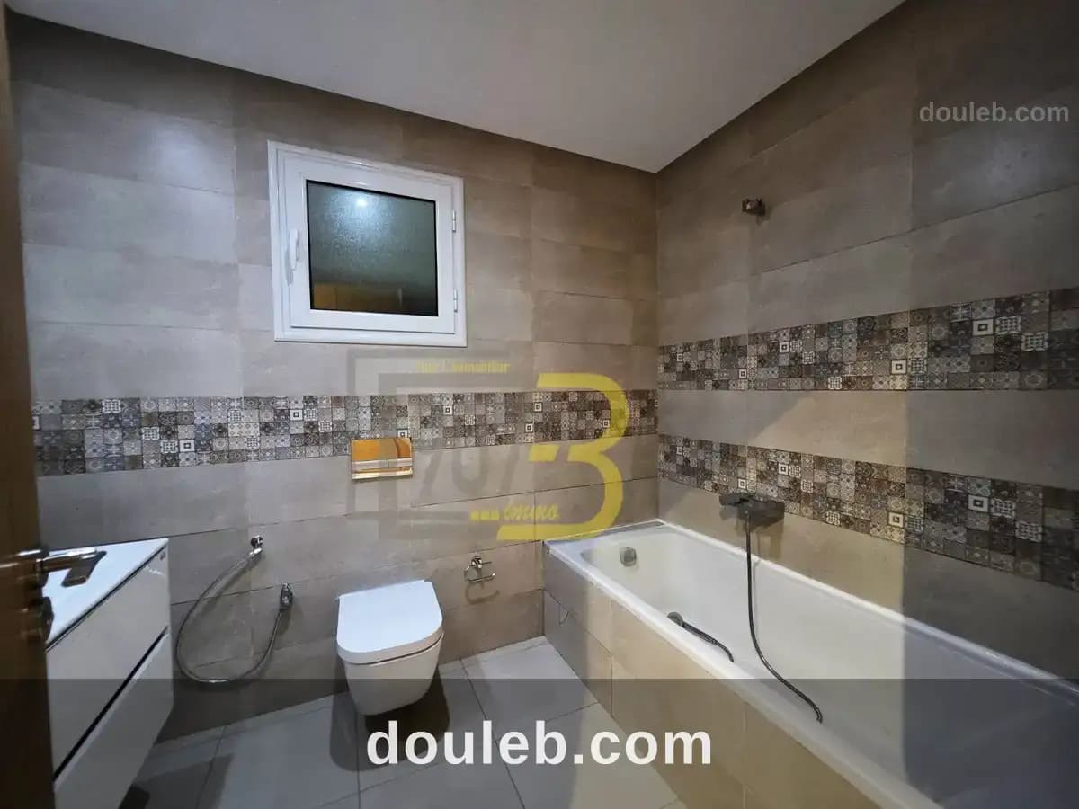 Un appartement s2 haut standing cité ennasr - Miniature 4