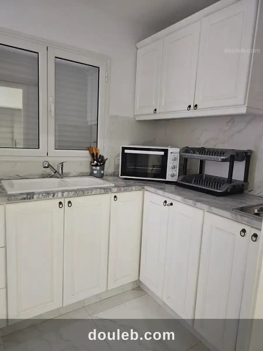 Appartement au rez de chaussé - Miniature 5
