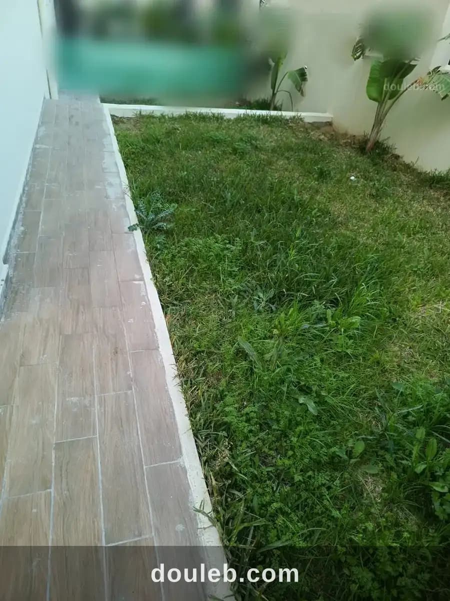 Appt s2 neuf avec jardin cité ennasr à Ariana