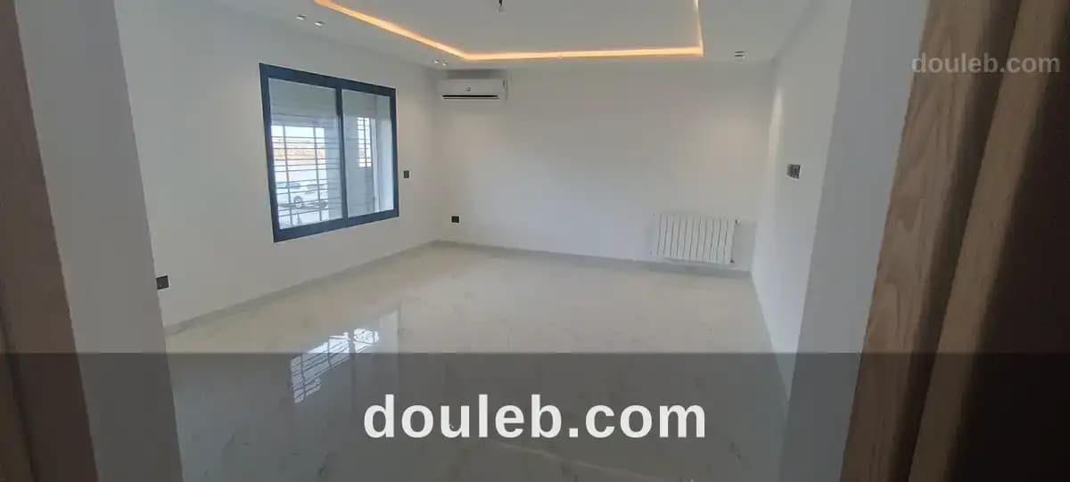 Appartement s2 avec jardin privé à ennasr à Ariana
