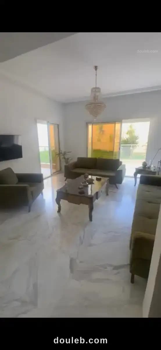 Appartement nasr 2 avec jardin - Miniature 4