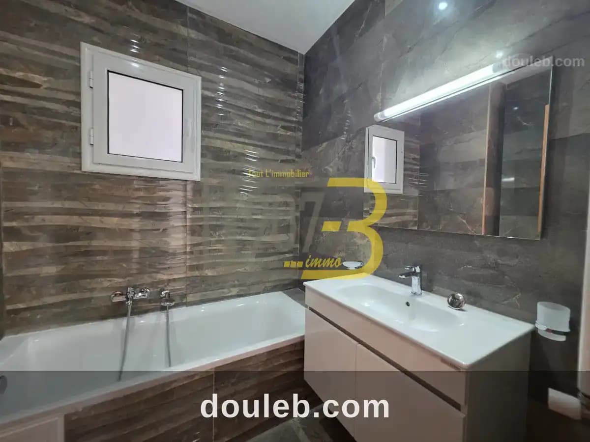 Un appartement s3 jamais habité à menzah 9c - Miniature 5
