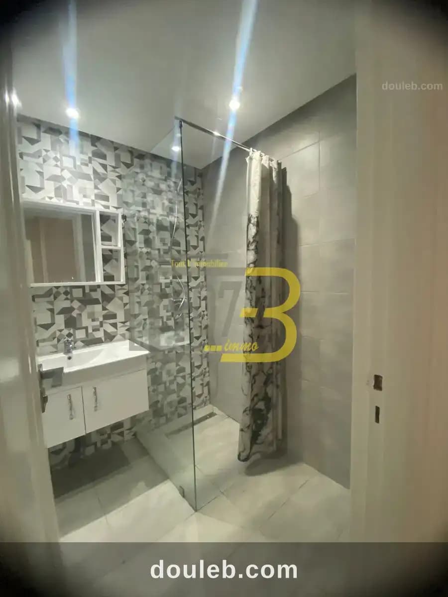 Un appartement s2 meublé à cité ennasr - Miniature 4