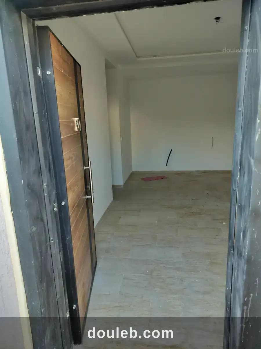 Un appartement et 2 locaux commerciaux - Miniature 3