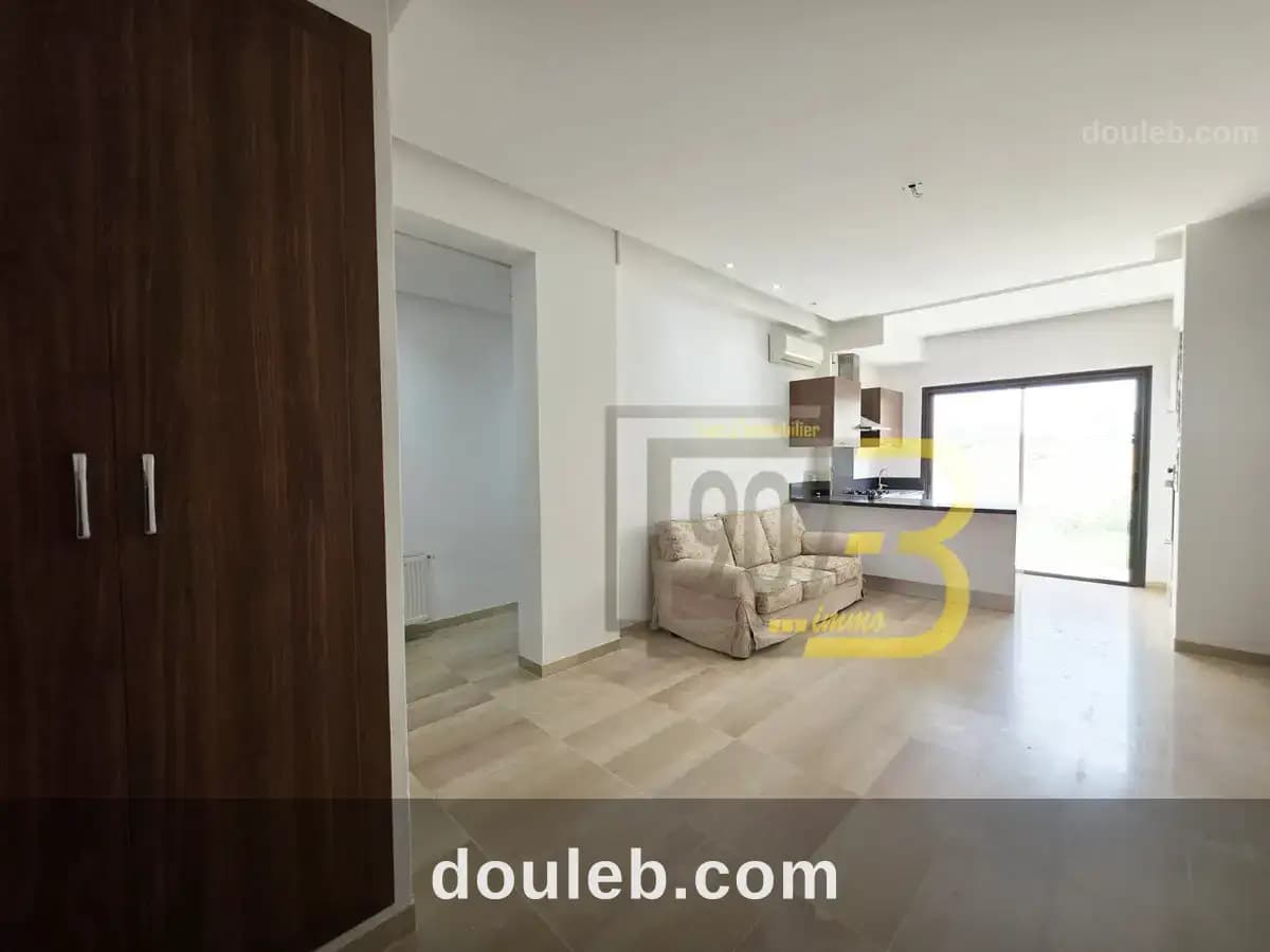 Un appartement s2 avec jardin à enassr 2 à Ariana