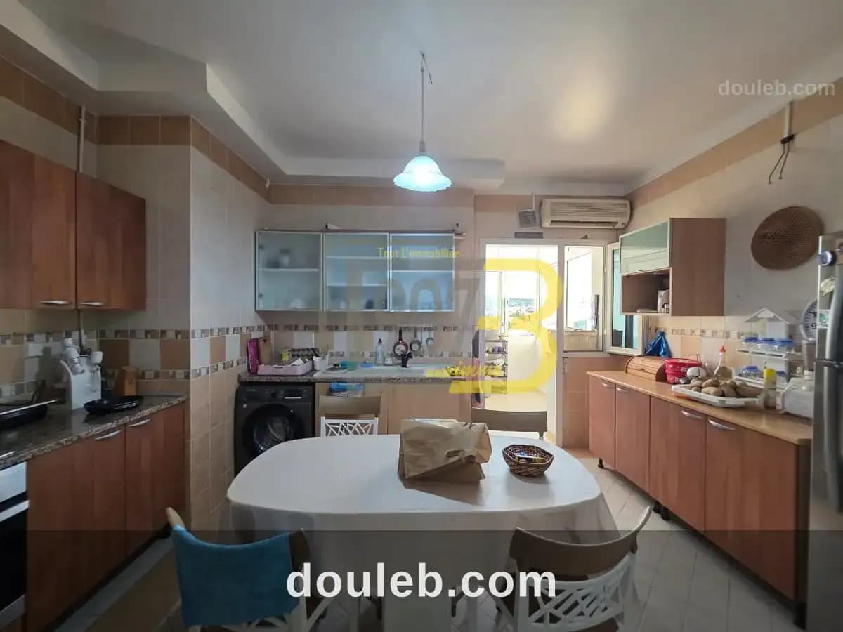 Un appartement s3 à cité ennasr - Miniature 4