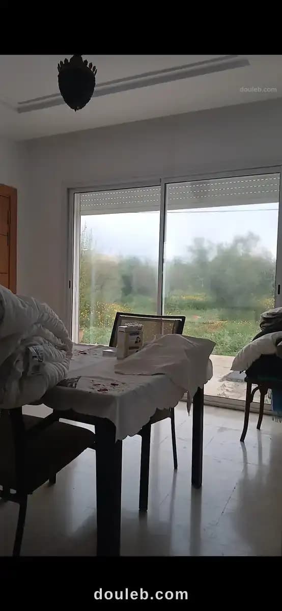 Terrain avec maison a borjtouil à Ariana