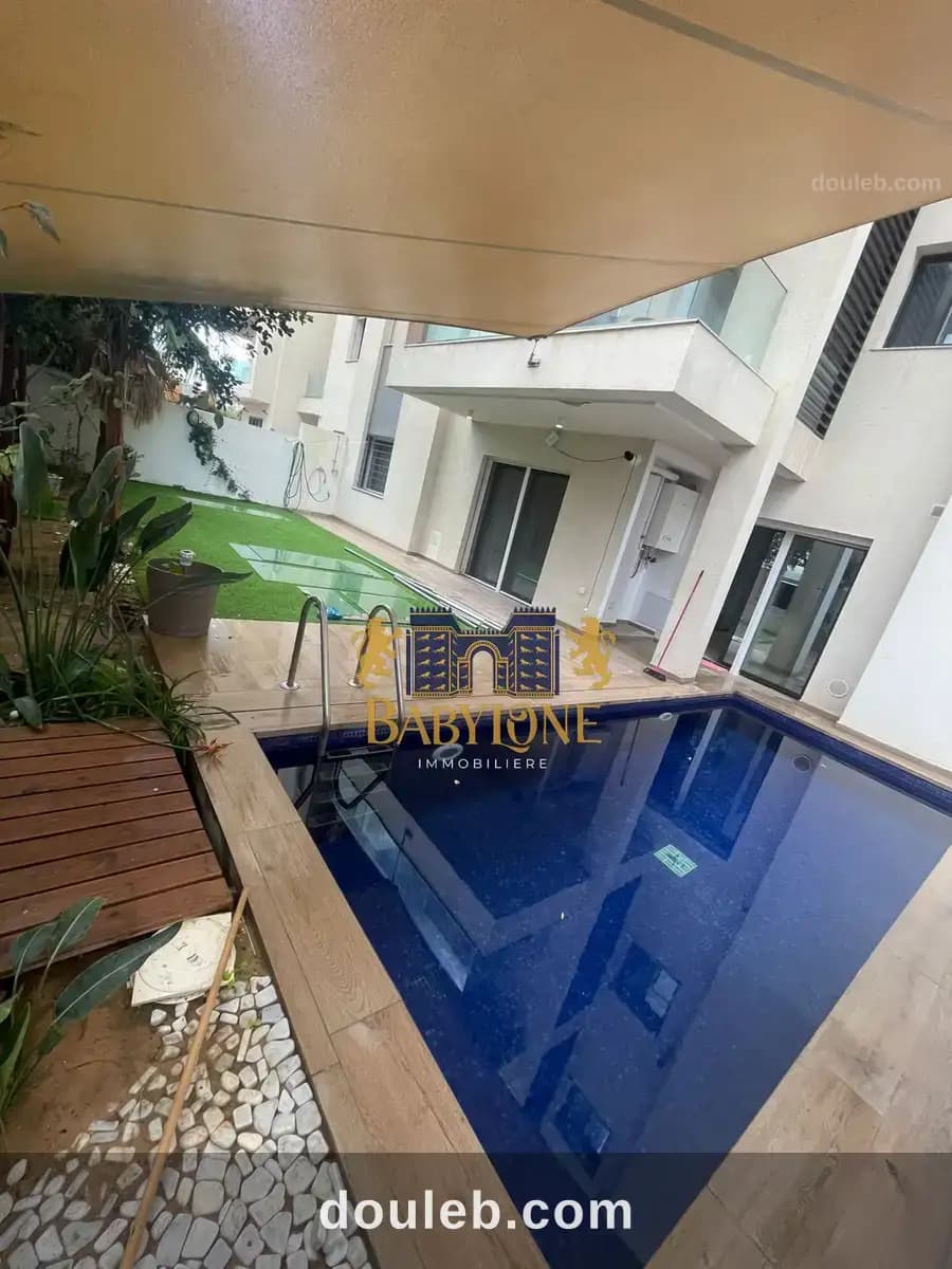 Un rdc avec piscine - Miniature 2
