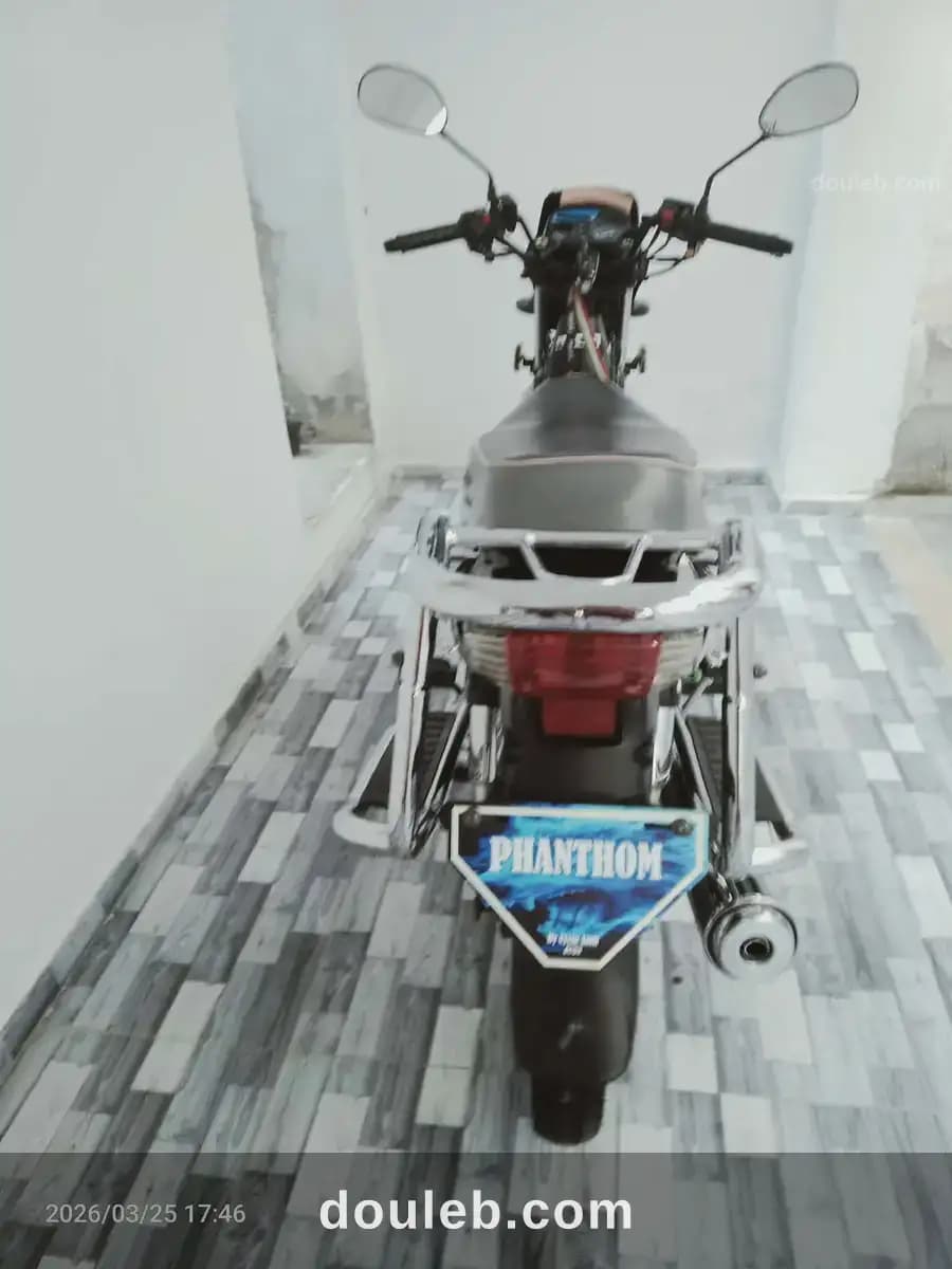 Jolie moto ohanthom à Ariana