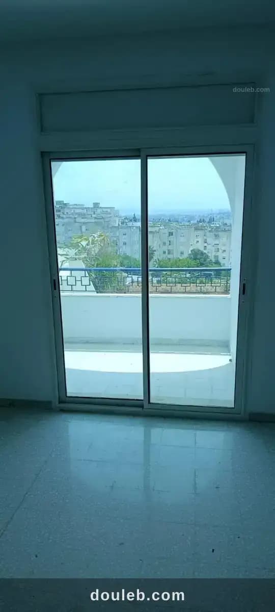 Un appartement s2 à ennasr 2 - Miniature 2