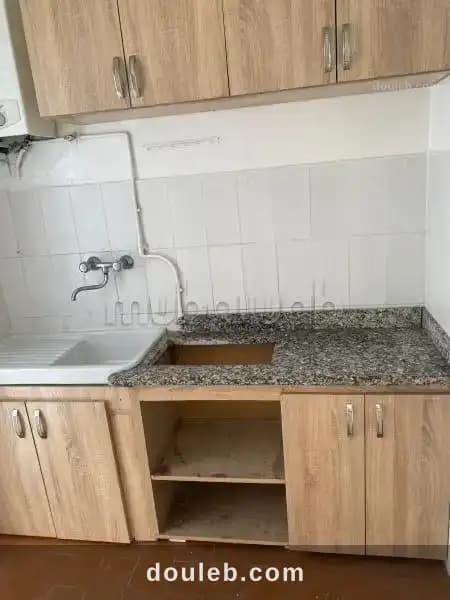 Un appartement en s1 à ennasr 1 - Miniature 2